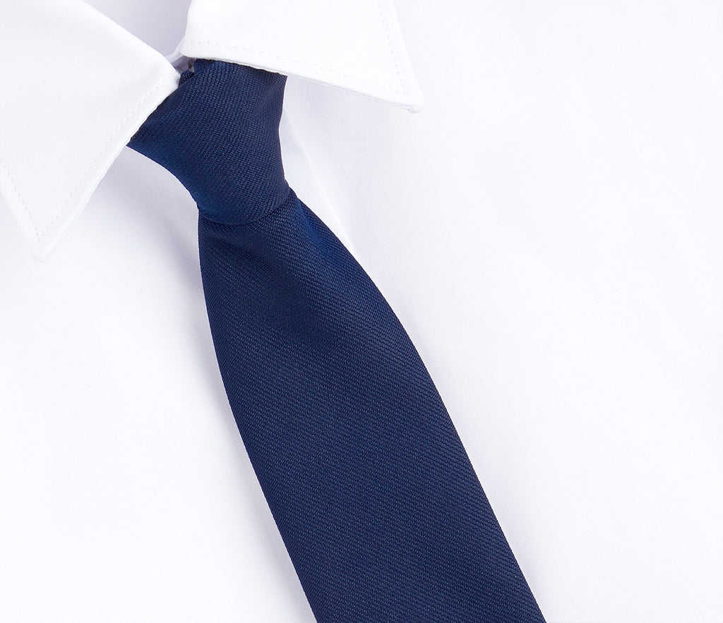 Wheatfield Primary School Clip-on Tie shown on a white shirt, highlighting its neat design and ease of wear, suitable for school uniforms.