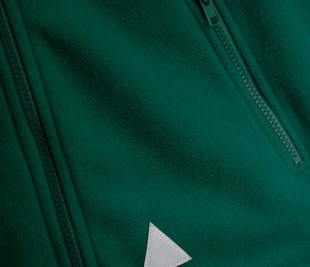 Zeco Polar Fleece - Bottle Green featuring dual zipper tracks and a triangular stitched patch, showcasing its heavyweight, anti-pill fleece fabric with YKK zips.