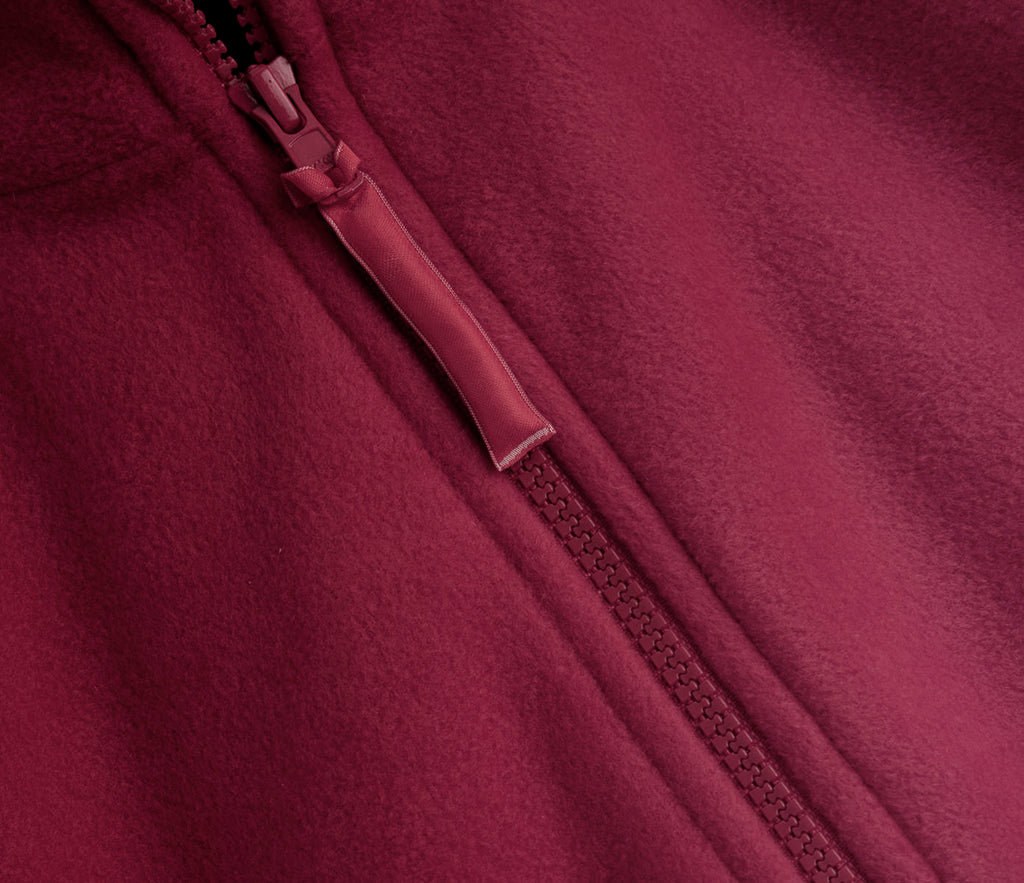 Zeco Polar Fleece - Burgundy features heavyweight fleece, a matching zipper, and a fabric pull tab, highlighting its craftsmanship and design.