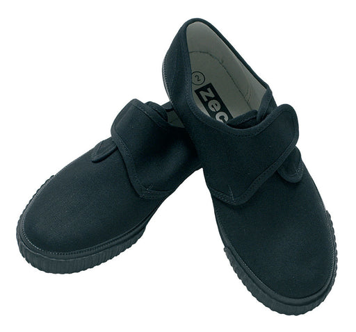 Plimsolls With Velcro, featuring a slip-on design with visible velcro fastening and cushioned insoles, highlighting a close-up of the brand logo.